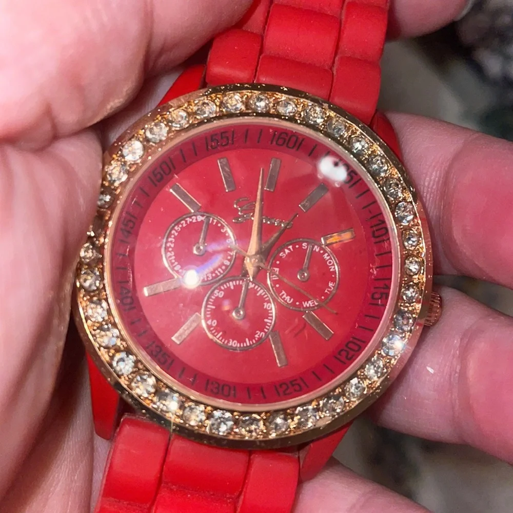 New red crystal watch round face silicone band Geneva